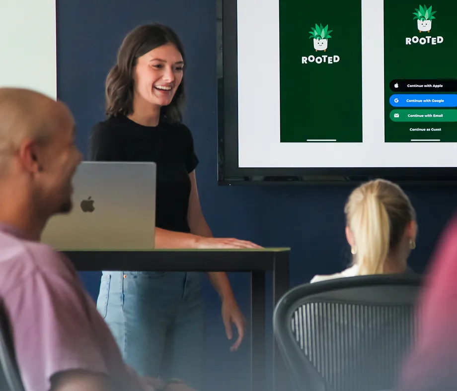 Person presenting to a group of people